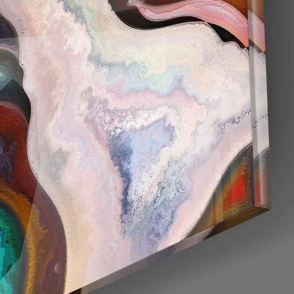 Vibrant glass wall art with swirling face portraits in pink, lavender, blue