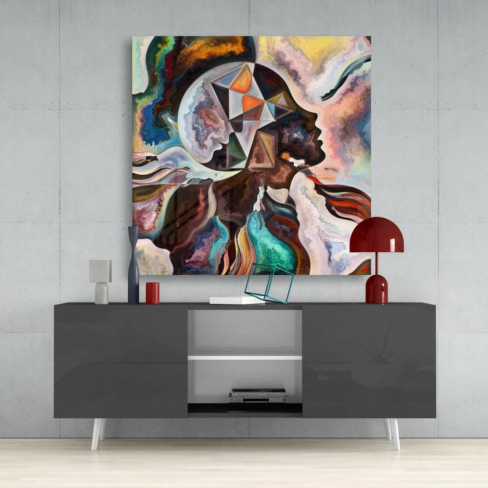 Vibrant abstract glass wall art with swirling face portraits