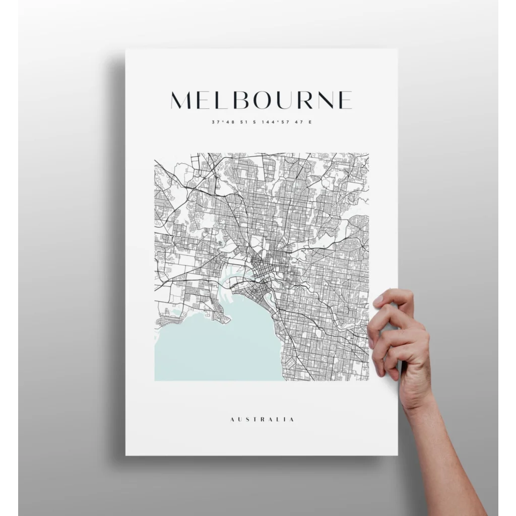 Hand holding white minimalist Melbourne map poster in black lines