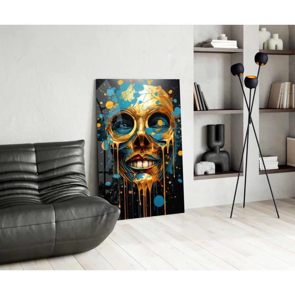 Golden skull glass wall art with vibrant blue yellow paint splashes