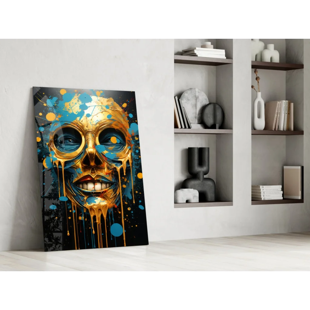 Golden skull glass wall art with blue paint splashes on black background