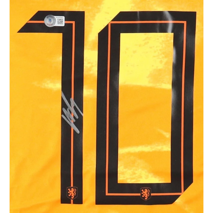 Orange Memphis Depay signed Nike jersey with black and orange number 10 and autograph