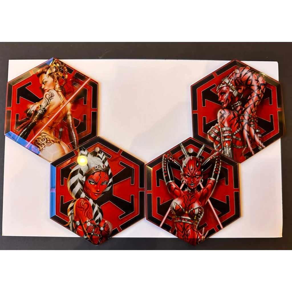 Merry Sithmas glass ornaments with red hexagonal Sith armor design