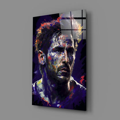 Vibrant abstract glass wall art portrait of spiky-haired man in explosive purple, blue, red, yellow strokes