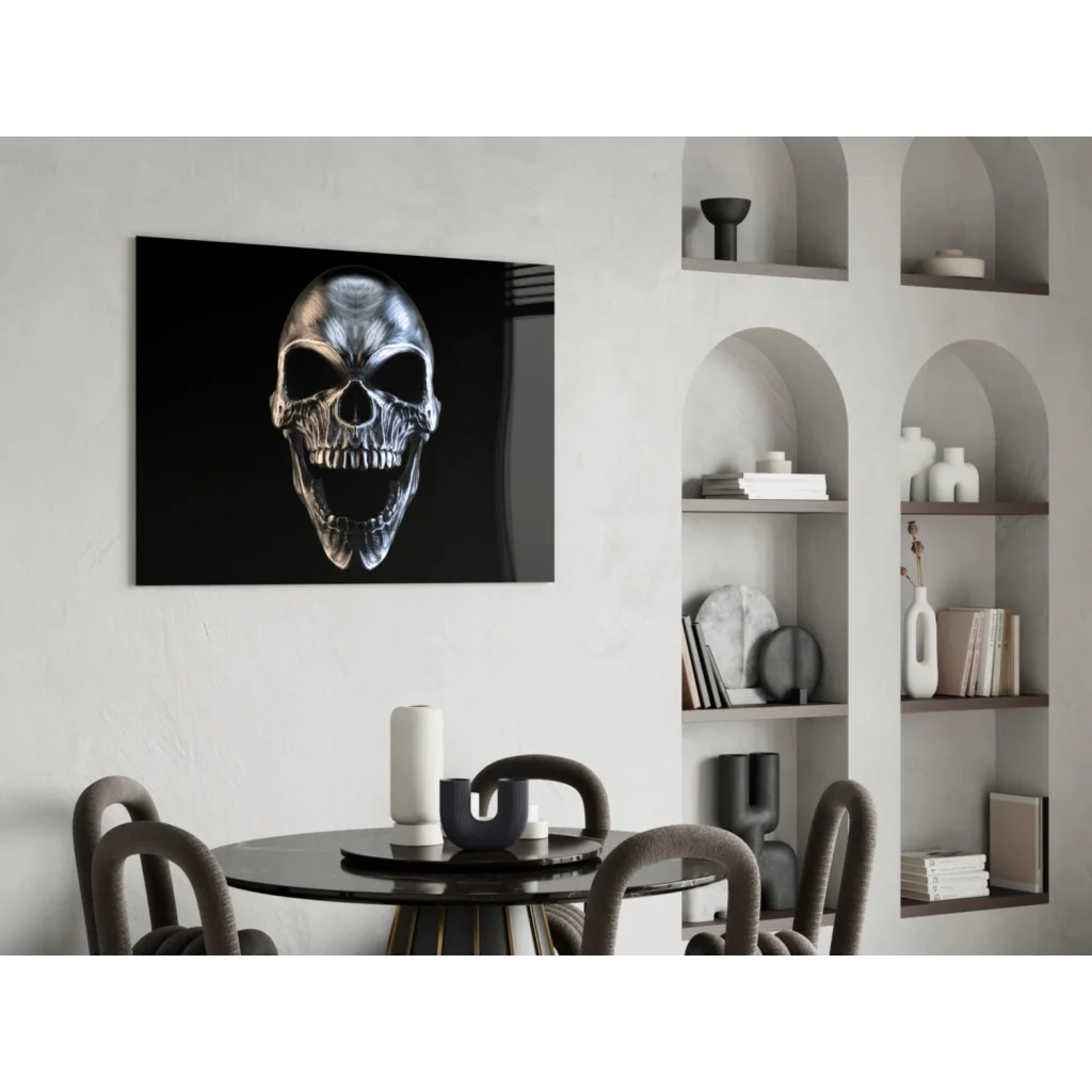 Sleek metallic silver skull glass wall art on black canvas