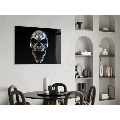 Sleek metallic silver skull glass wall art on black canvas