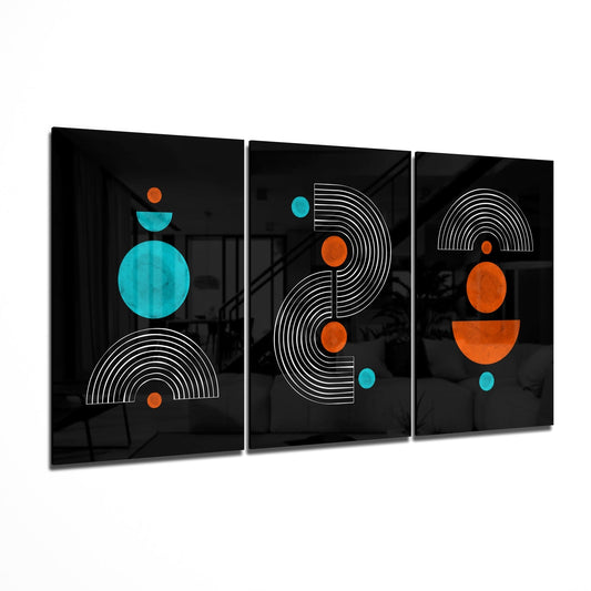 Three black glass panels with geometric designs in white lines, orange and turquoise circles arranged vertically, displayed at an angle.
