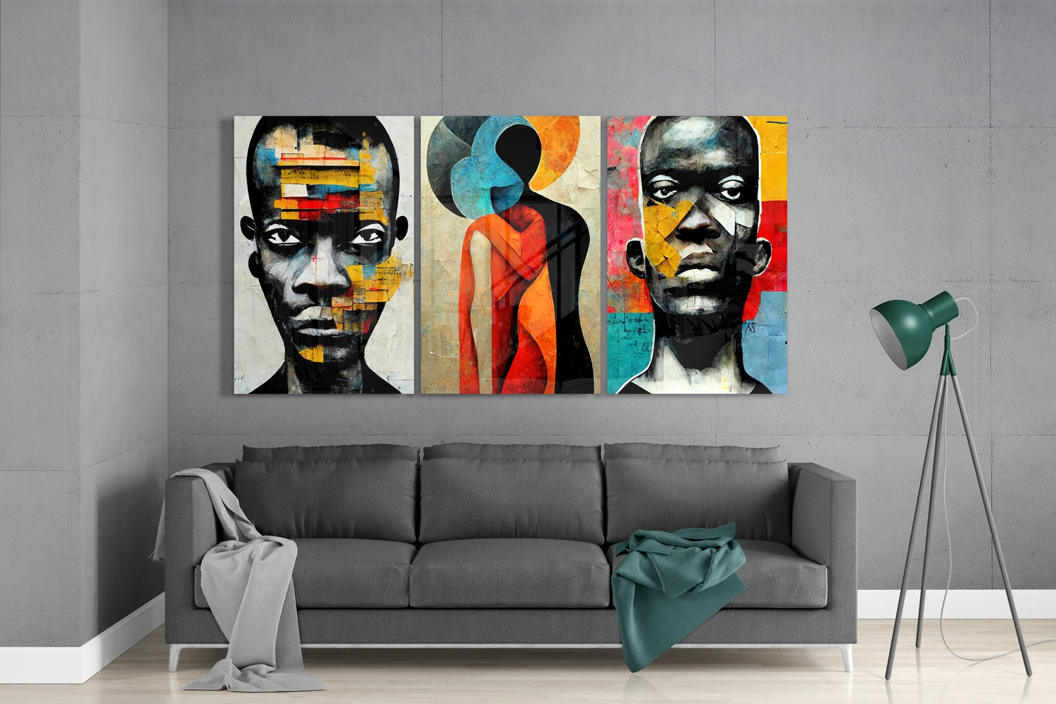 Three colorful abstract portrait glass panels displayed above gray sofa in modern living room interior.