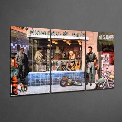 Three-panel glass wall art displaying retro storefronts with figures, guitars, motorcycles, and "Highway 51 Band" signage against gray background.