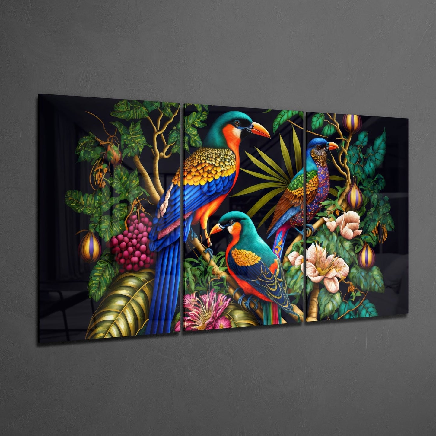 Three-panel glass wall art displaying vibrant tropical birds with blue, orange, and teal plumage among colorful flowers and green foliage on black background.