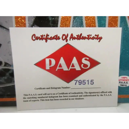 White certificate of authenticity with red diamond logo for Miami Dolphins signed autographed metal collectible