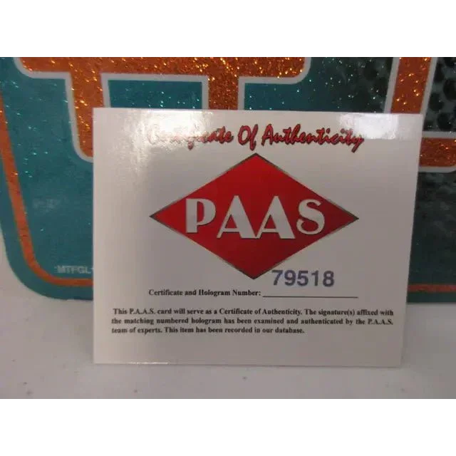 White certificate of authenticity with red PAAS logo for Miami Dolphins signed autographed metal collectible