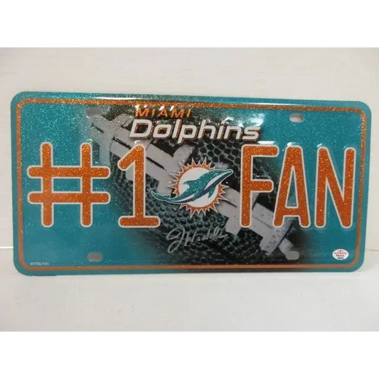 Glittery teal and orange Miami Dolphins signed autographed metal license plate with football background