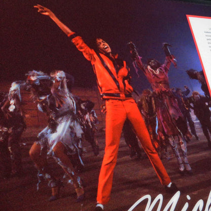 Michael Jackson autographed contract framed display with orange jumpsuit image