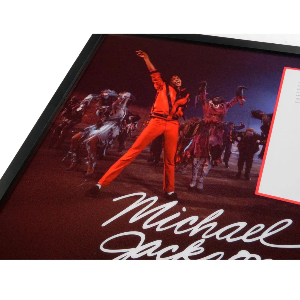 Framed Michael Jackson autographed contract display with orange jumpsuit poster