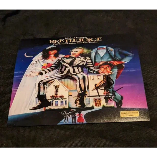 Michael Keaton autographed Beetlejuice movie poster with vibrant artwork and COA