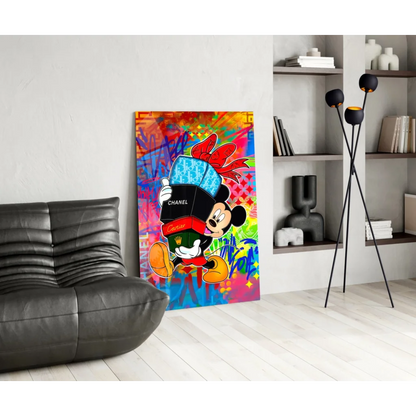 Mickey Mouse in blue Chanel hat holds black Cartier box on vibrant graffiti wall art canvas
