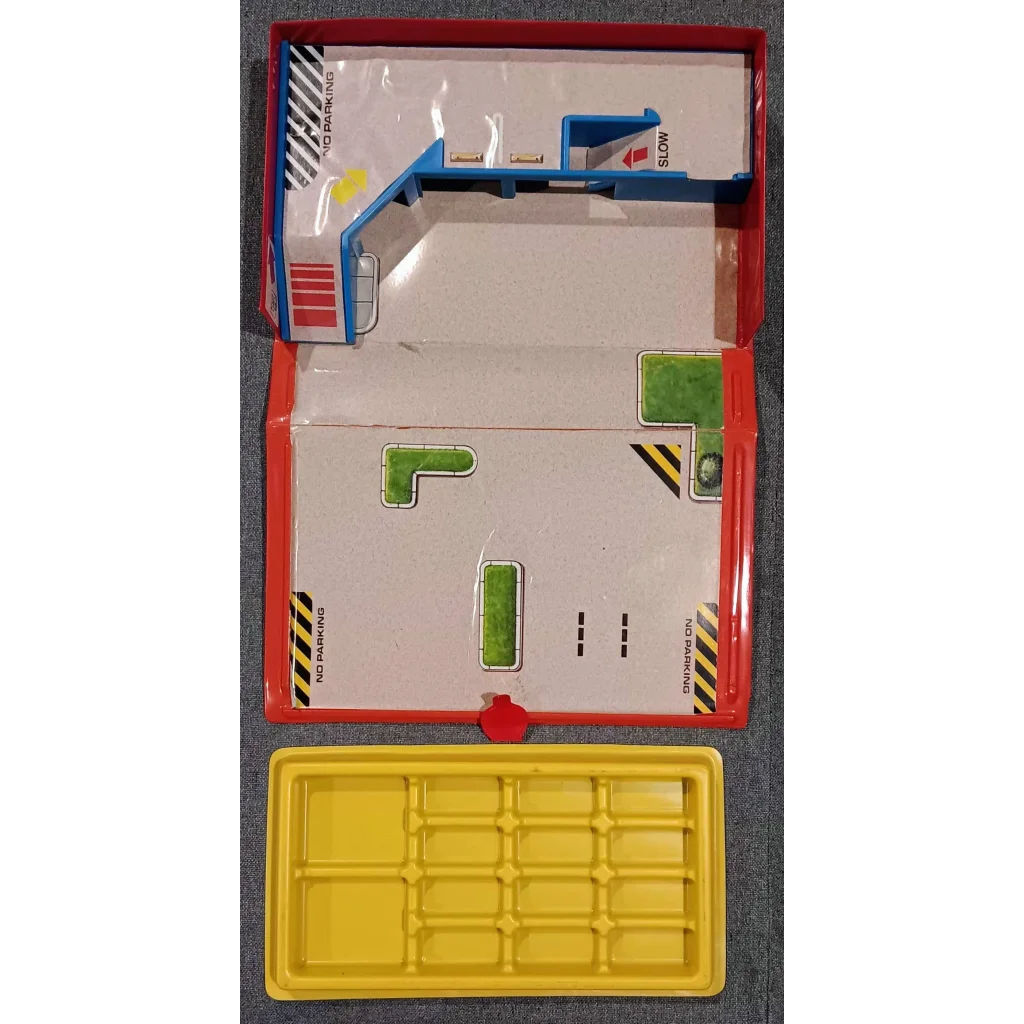 Vintage Micro Machines City Service Center action playset with red white race track