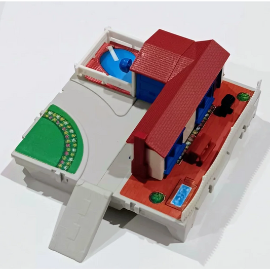 3D-printed micro machines travel city suburban house with red roof and blue walls