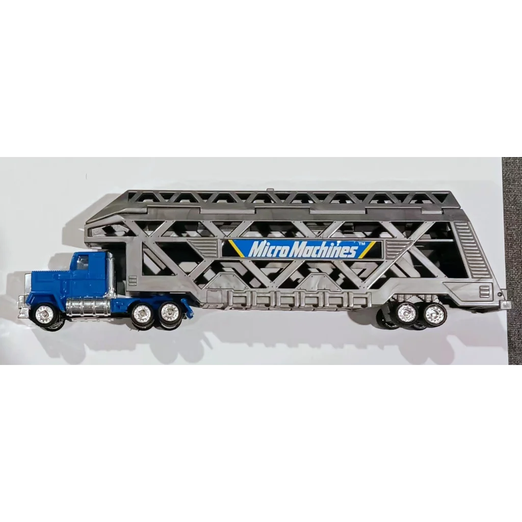 Vintage 1988 Micro Machines blue silver toy truck car carrier hauler