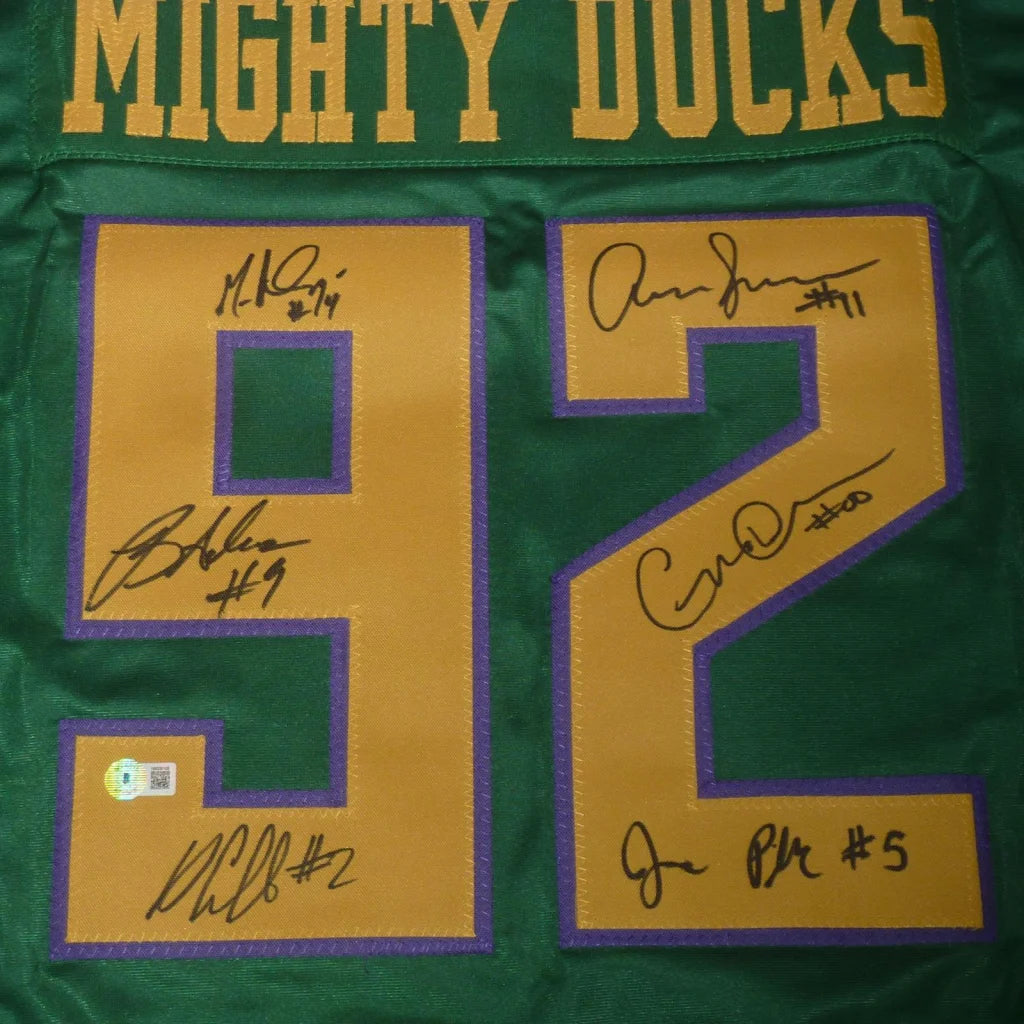 Autographed Mighty Ducks green #92 jersey with Ducks fly together signatures