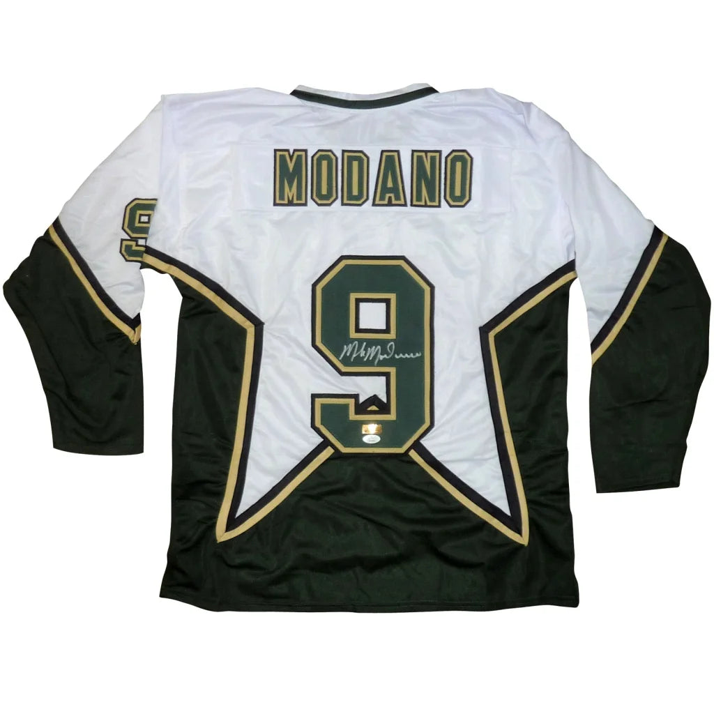 Mike Modano autographed Dallas Stars white jersey with gold trim, number 9