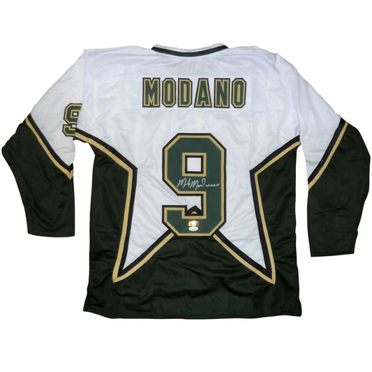 Mike Modano autographed Dallas Stars white jersey with gold trim, number 9