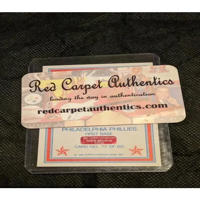 Mike Schmidt autographed baseball card with COA and authentication sticker in protective sleeve