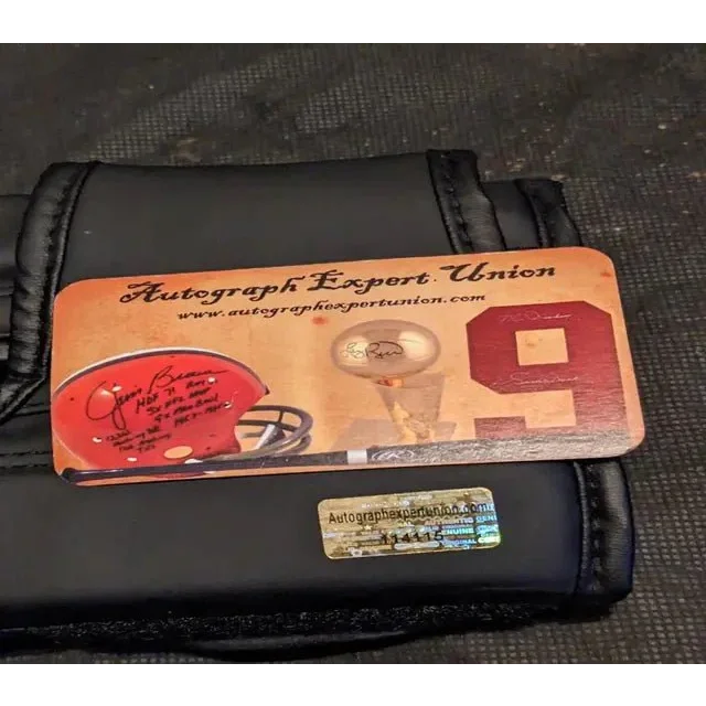 Brown rectangular card with sports memorabilia graphics, Mike Tyson auto signed boxing collectible