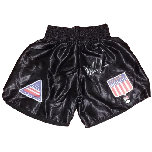 Mike Tyson autographed black boxing trunks with American flag patches