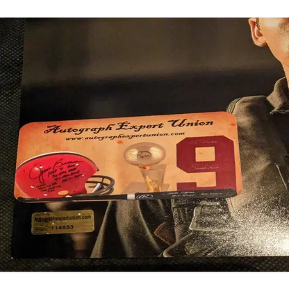 Autograph Export Union certificate of authenticity with football helmet and trophy for Miles Teller auto signed 8x10 Top Gun Maverick photo