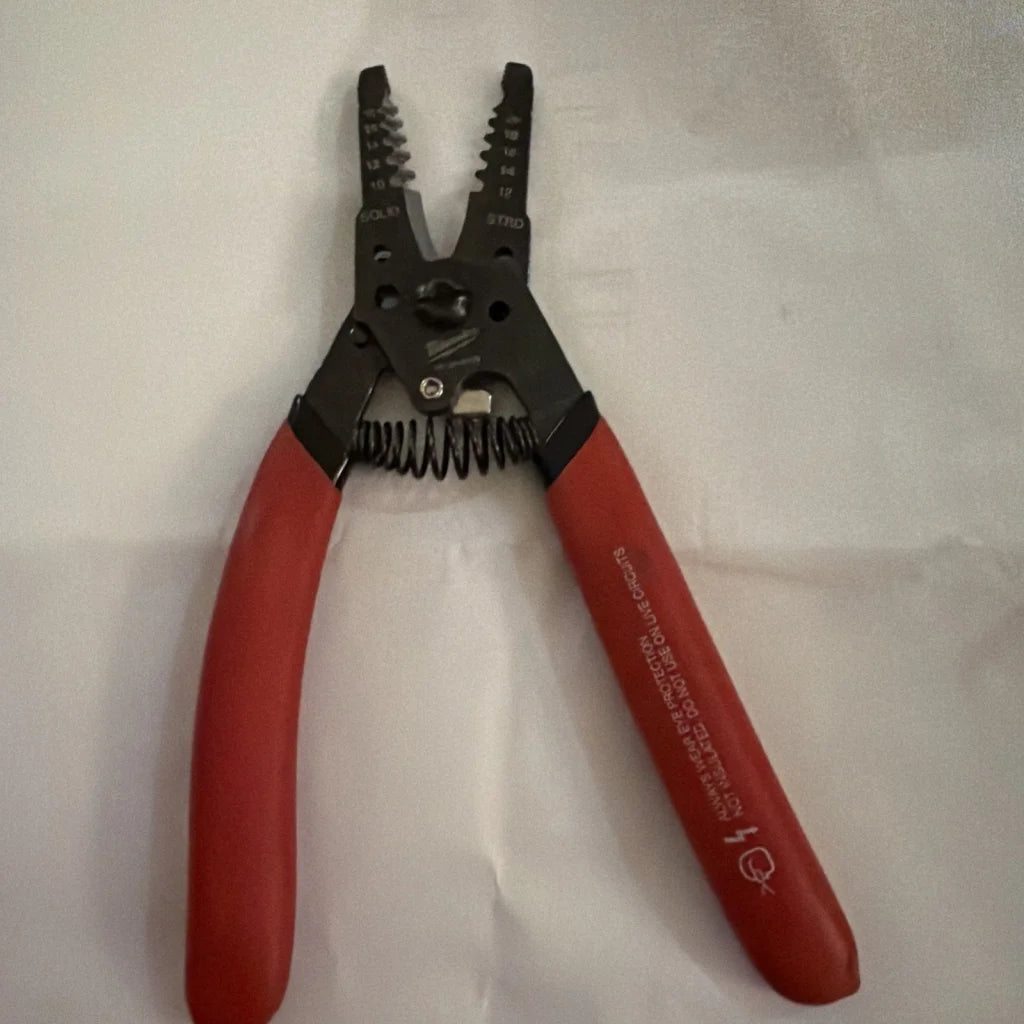 Milwaukee automatic wire stripper 10-20 AWG red handles black jaws spring