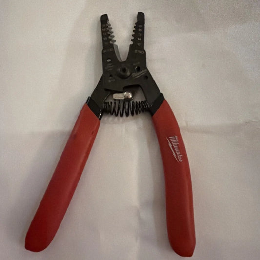 Milwaukee automatic wire stripper 10-20 AWG red handles black jaws spring
