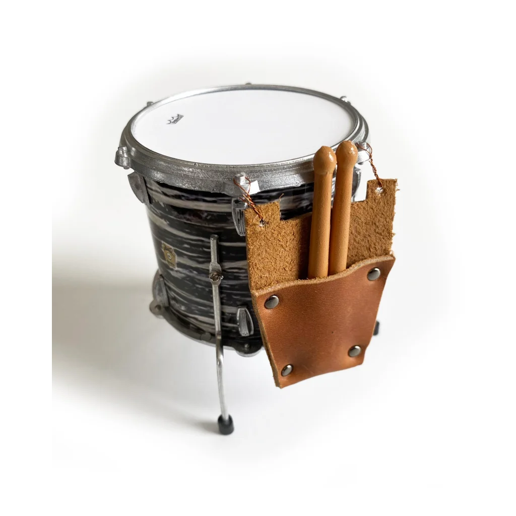 Mini leather drumstick bag with cork lining and metal hardware