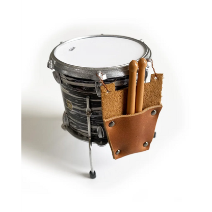 Mini leather drumstick bag with cork lining and metal hardware