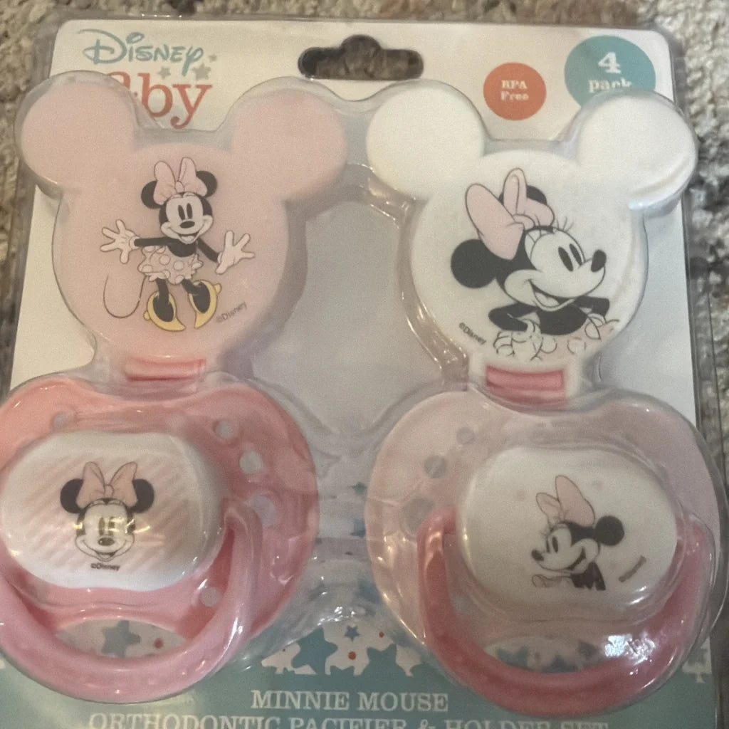 Pink and white Minnie Mouse pacifiers set in Disney Baby package