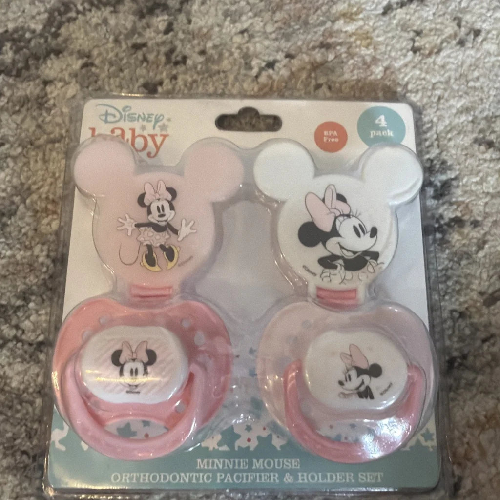 Minnie Mouse pacifiers set in pink white with black gold details
