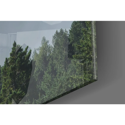 Sleek glass wall art of misty green forest with Luke Bible verse