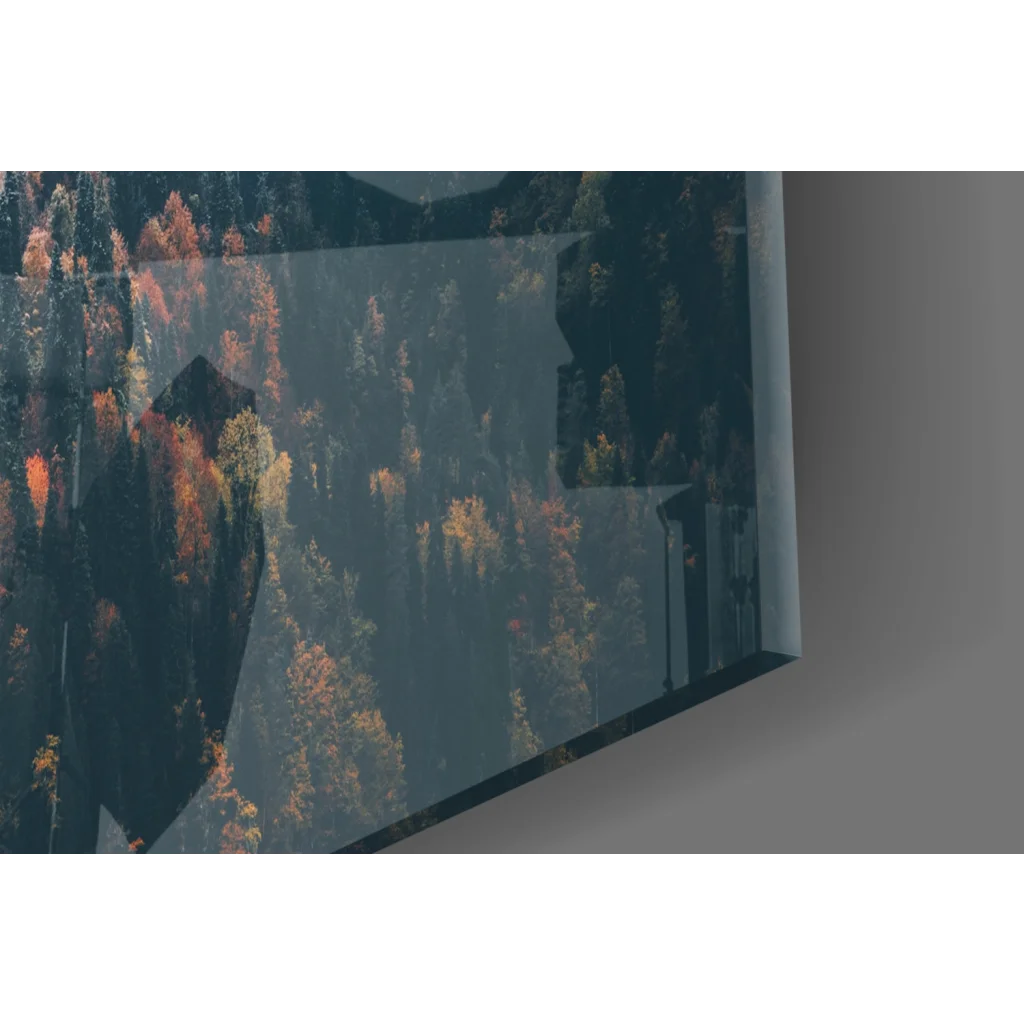 Sleek TV showing Misty Mountain Forest glass wall art with vivid autumn trees