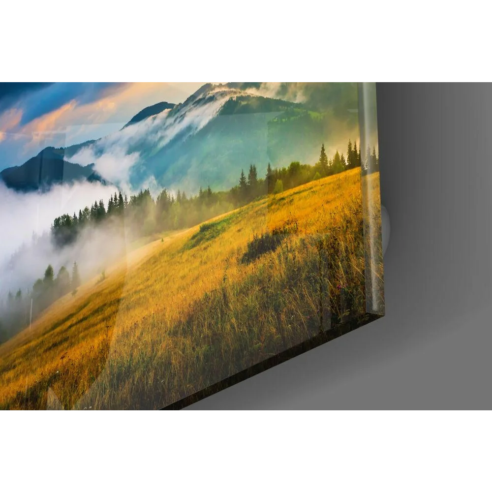 Misty Mountain glass wall art with golden meadows and misty peaks
