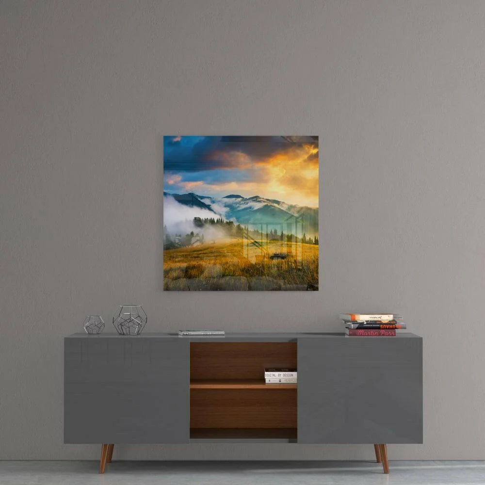 Modern gray sideboard with open shelves and copper legs under Misty Mountain glass wall art