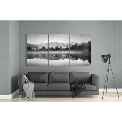 Misty Mountain Lake black-and-white glass wall art triptych with misty lake and mountain reflections