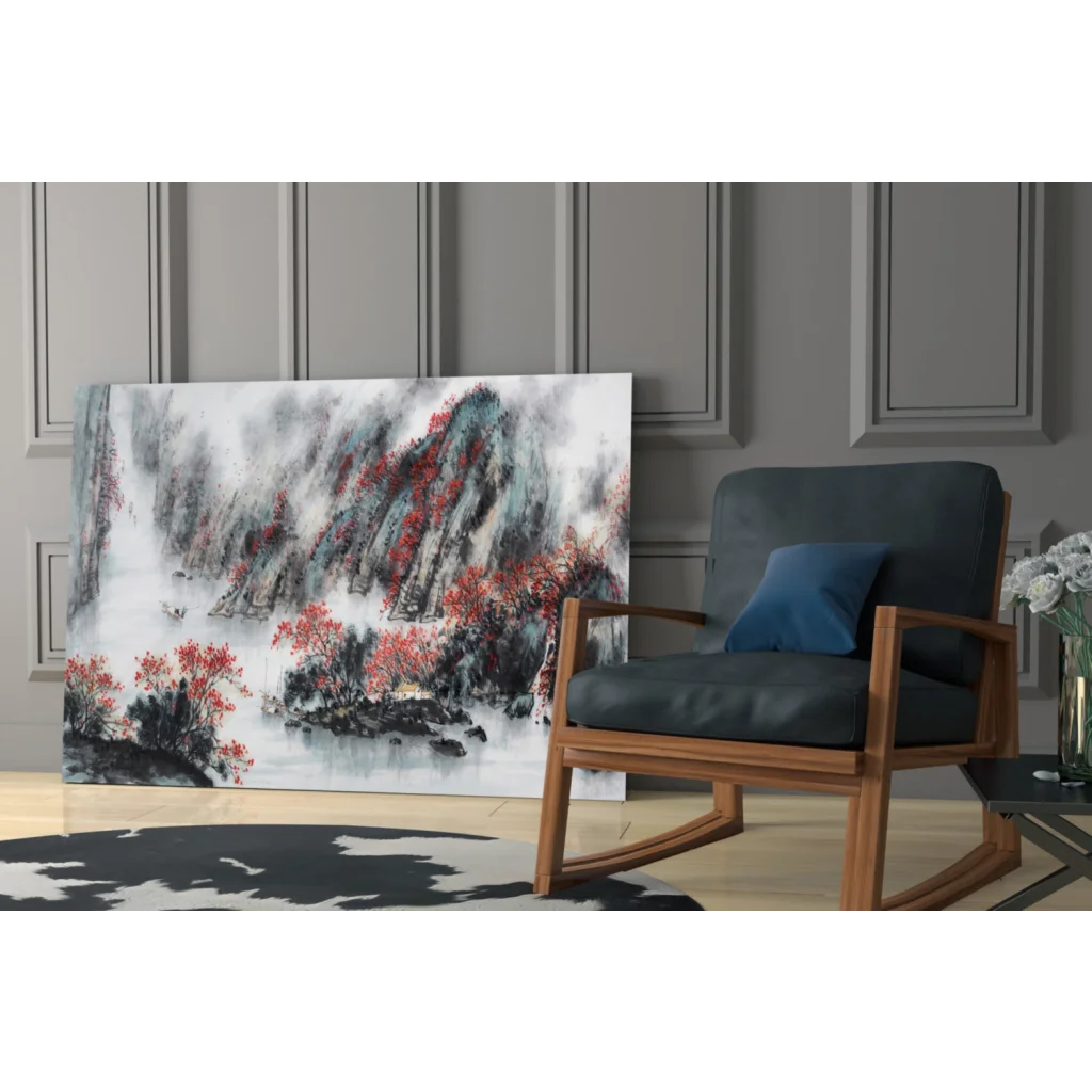 Modern wooden rocking chair with blue cushion under Misty Mountain wall art