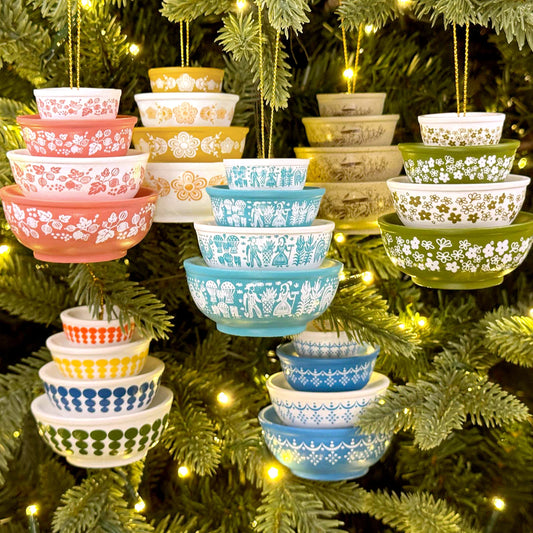 Mini mixing bowl ornaments hanging on a Christmas tree