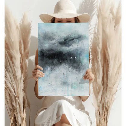 White wide-brimmed hat with black trim on modern abstract print