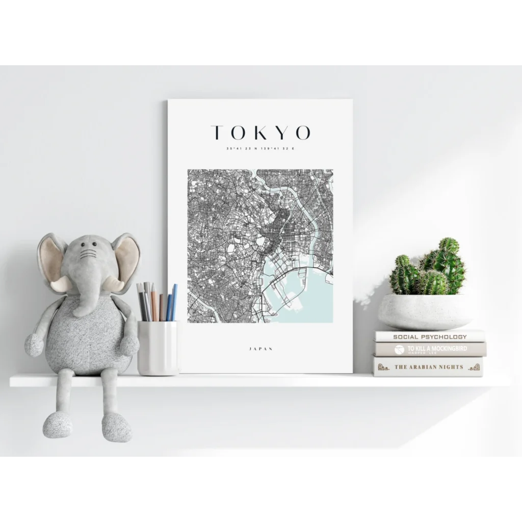 Grey plush elephant toy on Modern Tokyo Map print shelf
