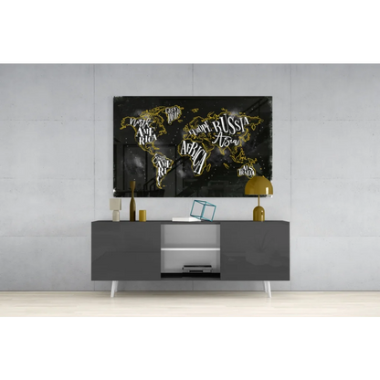 Gold traced black world map canvas wall art with white lettering