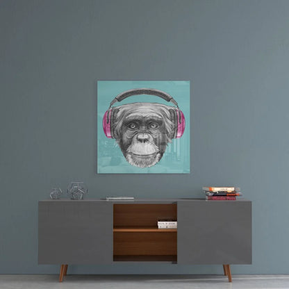 Stylized chimp in pink headphones on teal, tempered glass art print