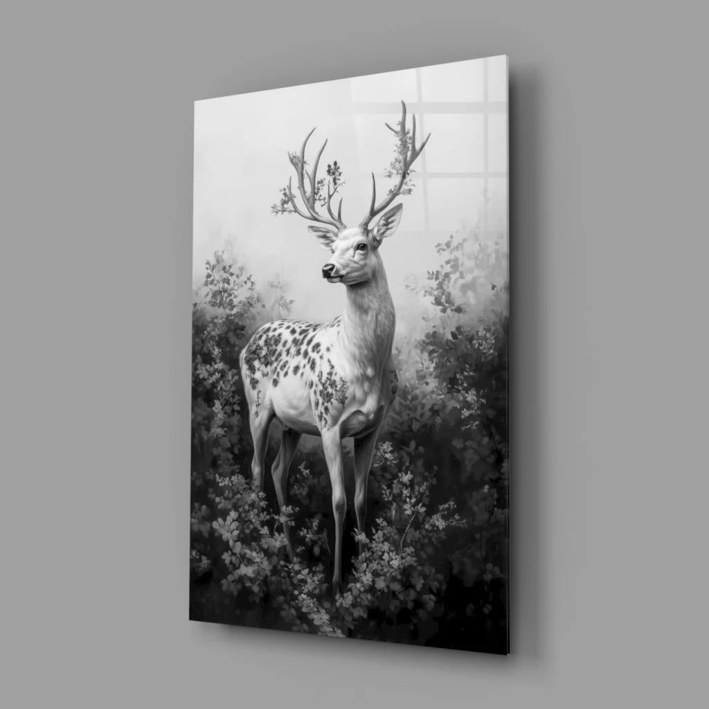 Majestic stag wall art: black-and-white spotted deer with foliage antlers in misty forest
