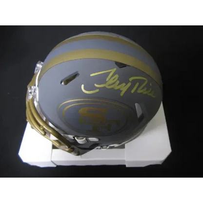 Grey football helmet with gold stripes and San Francisco 49ers logo for Montana San Francisco signed mini helmet
